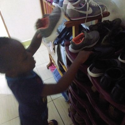 Jayden-Pairing up shoes.jpg